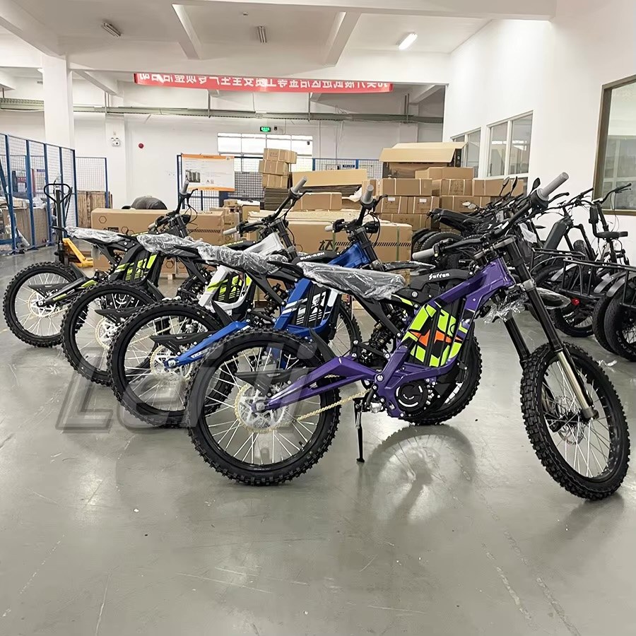 Sur-Ron bikes lined up in a warehouse