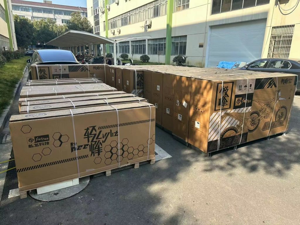 Sur-Ron Light Bee and Ultra Bee boxes on pallets